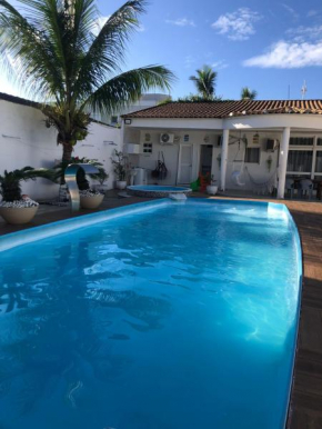 Casa Guarujá Esquina com Beira mar com Piscina grande na Enseada Pé na areia 50 metros